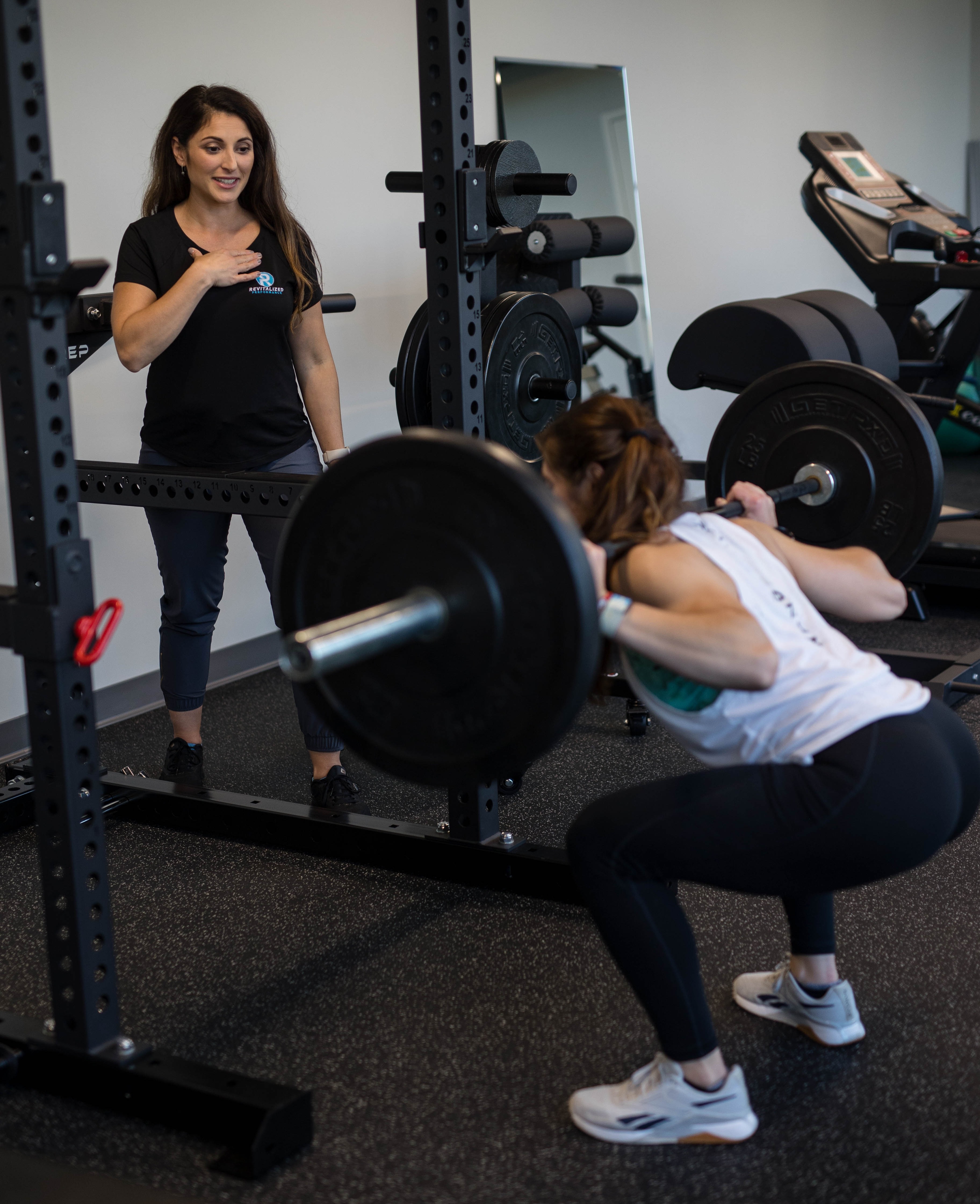 Patient working with a provider at a performance training clinic in Manchester, NH during a strength and conditioning session